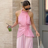 Sleeveless high neck top with lace up waist detail