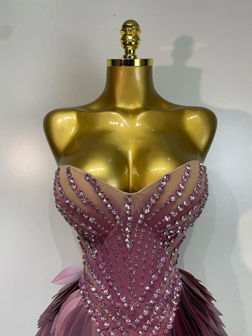 Strapless beaded feather mini dress close-up of bodice