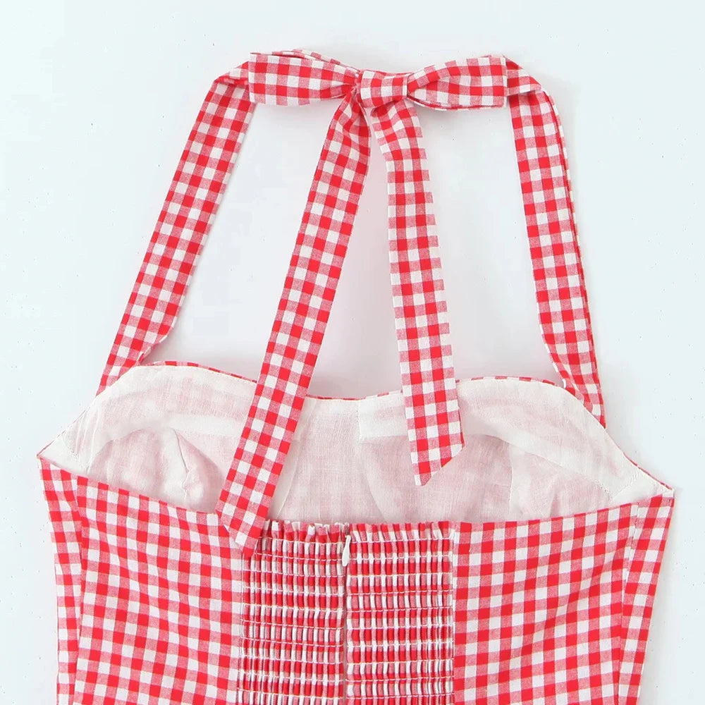 Red and white checkered apron on a light gray background