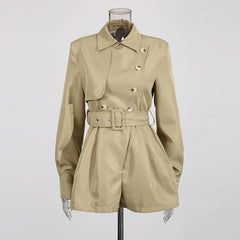 Beige trench coat on a mannequin against a white background