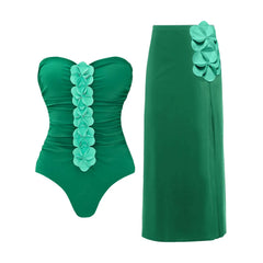 Strapless swimsuit with green floral appliqués and matching high-waist maxi skirt