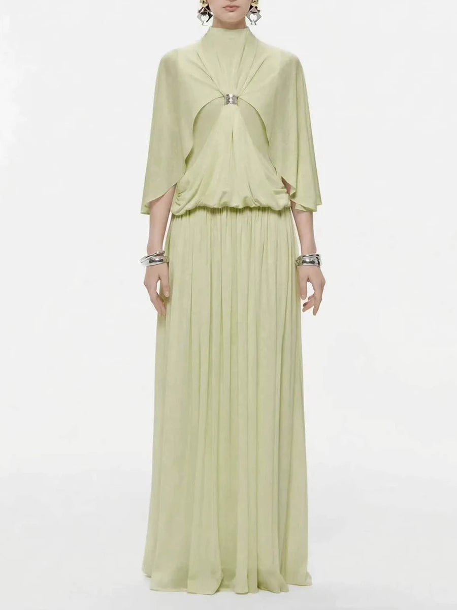Green chiffon maxi dress with cape sleeves and jewel buckle