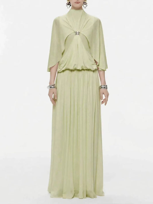 Green chiffon maxi dress with cape sleeves and jewel buckle
