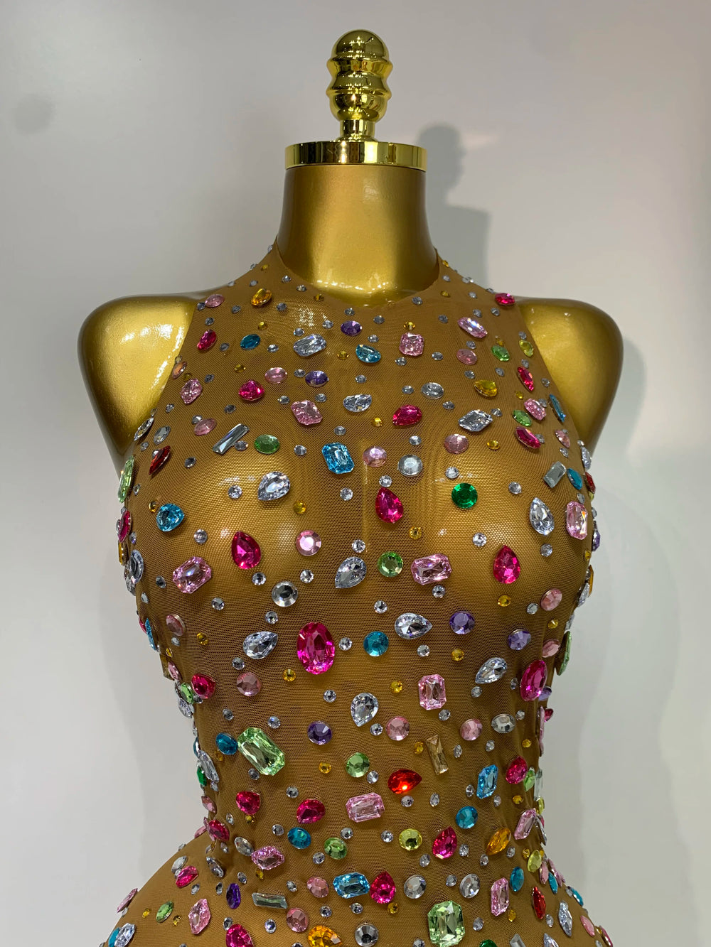 Model wearing rhinestone mesh bodysuit