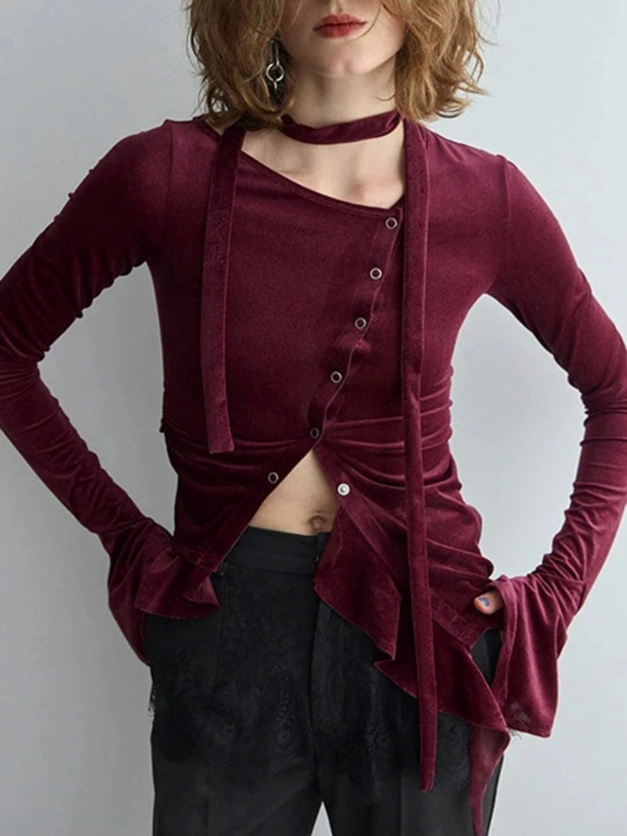 Velvet asymmetrical buttoned ruffle hem top detailed view