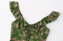 Close-up of ruffle V-neckline on floral midi dress