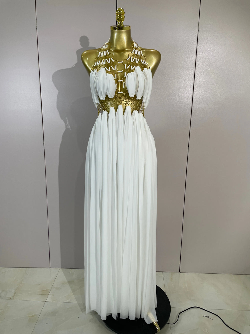 White halter neck maxi dress with gold trim