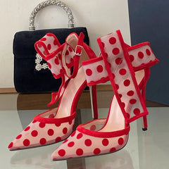 Polka dot mesh stiletto heels styled with a black handbag