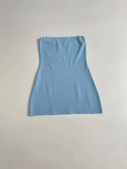 Light blue dress on a light gray background