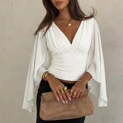 Ruched V-neck cape sleeve top in white with accessories
