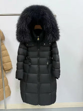 Black puffer coat with large fur hood