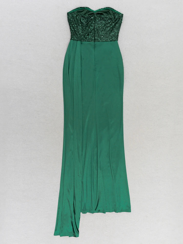 Green strapless dress with sequined top on a white background
