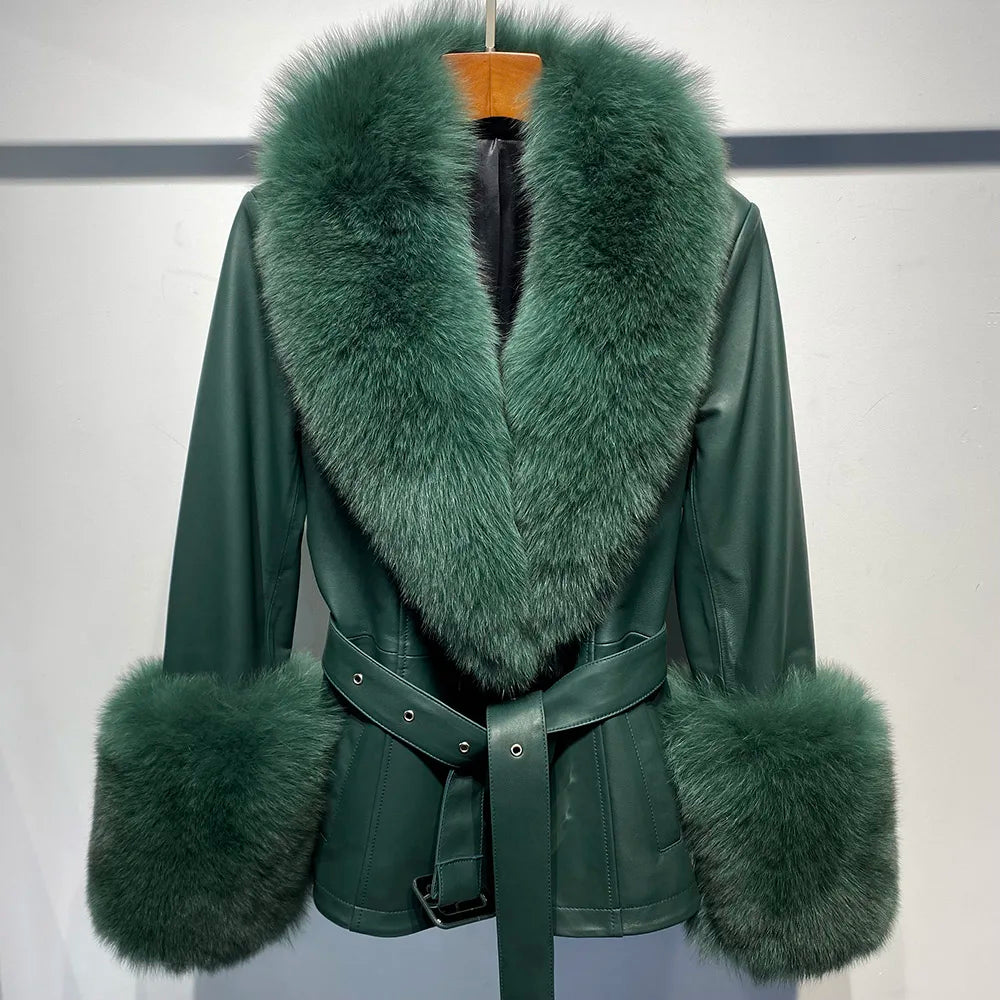 Green leather jacket with fur trim on a mannequin against a plain background