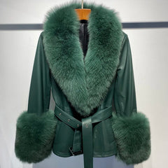 Green leather jacket with fur trim on a mannequin against a plain background