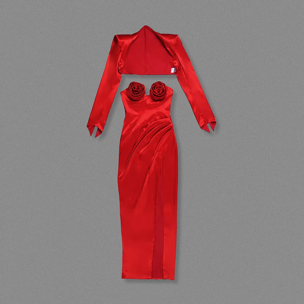 Red satin outfit with long sleeves and rose details on a gray background