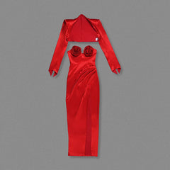 Red satin outfit with long sleeves and rose details on a gray background