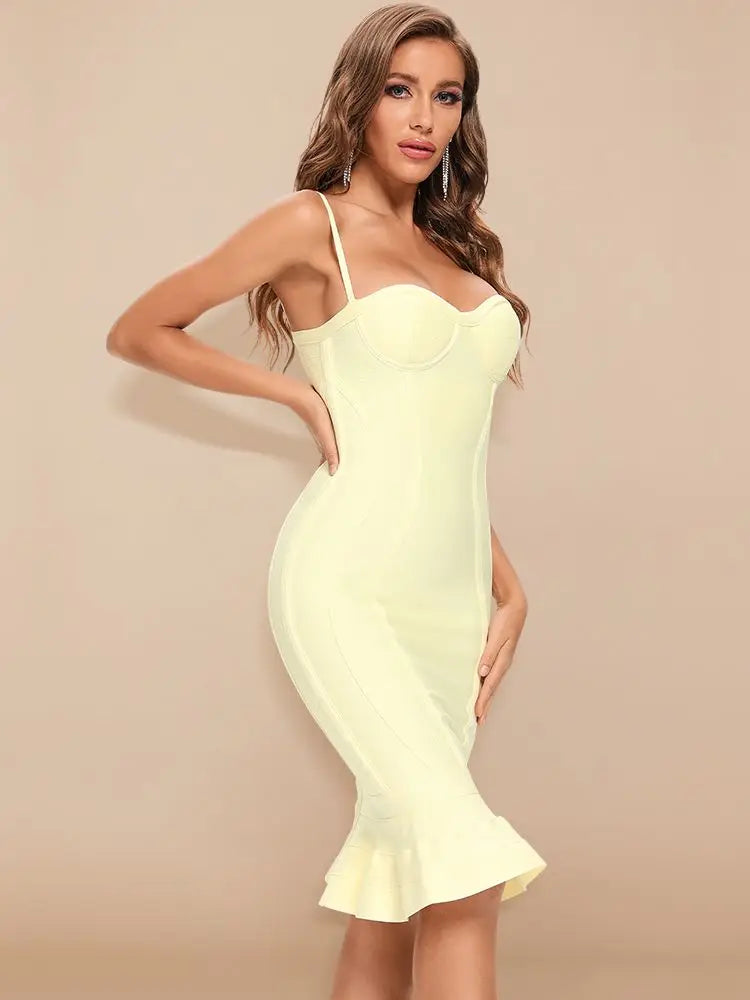 Woman wearing a light yellow dress against a beige background