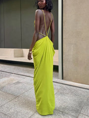 Back view of cut-out halter maxi dress with delicate straps