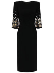 Front view of black midi dress with embellished three-quarter sleeves