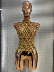 Sparkling mesh halter neck top in rose gold with gold embellishments.