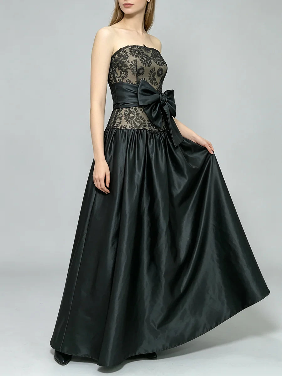 Strapless lace bodice full skirt gown with bow accent