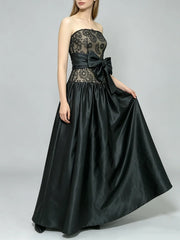 Strapless lace bodice full skirt gown with bow accent