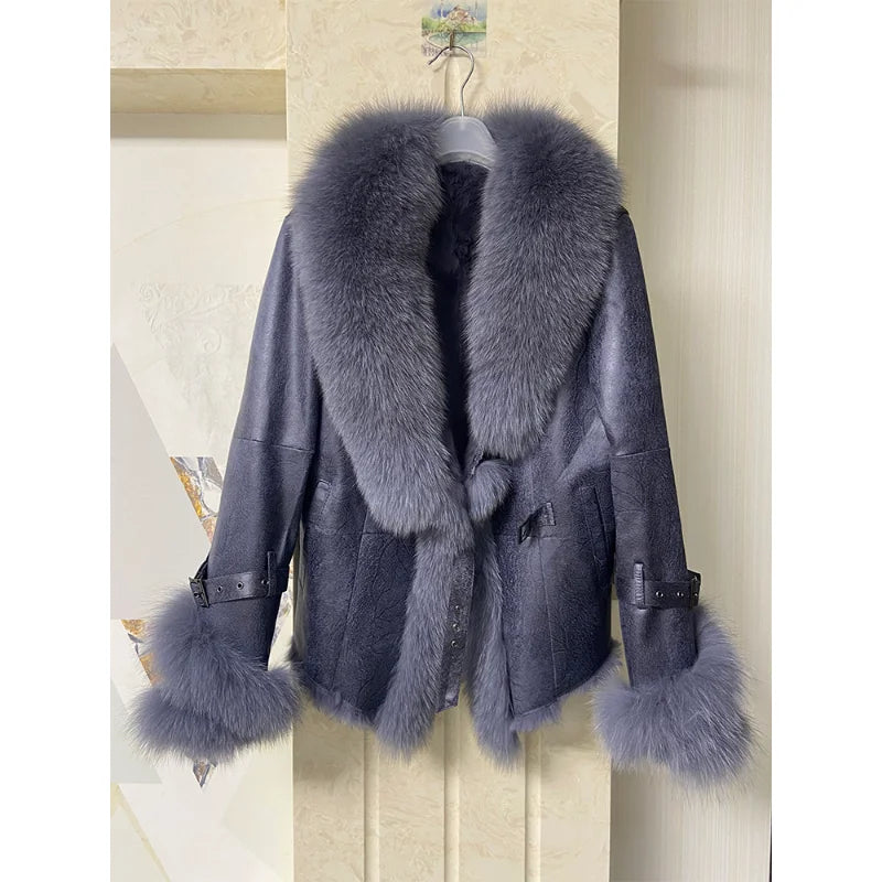 Dark grey shearling jacket with a grey fox fur collar and cuffs.