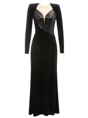 Black evening gown with sequin detailing on a white background