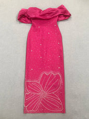 Pink off-shoulder dress with floral pattern on a gray background