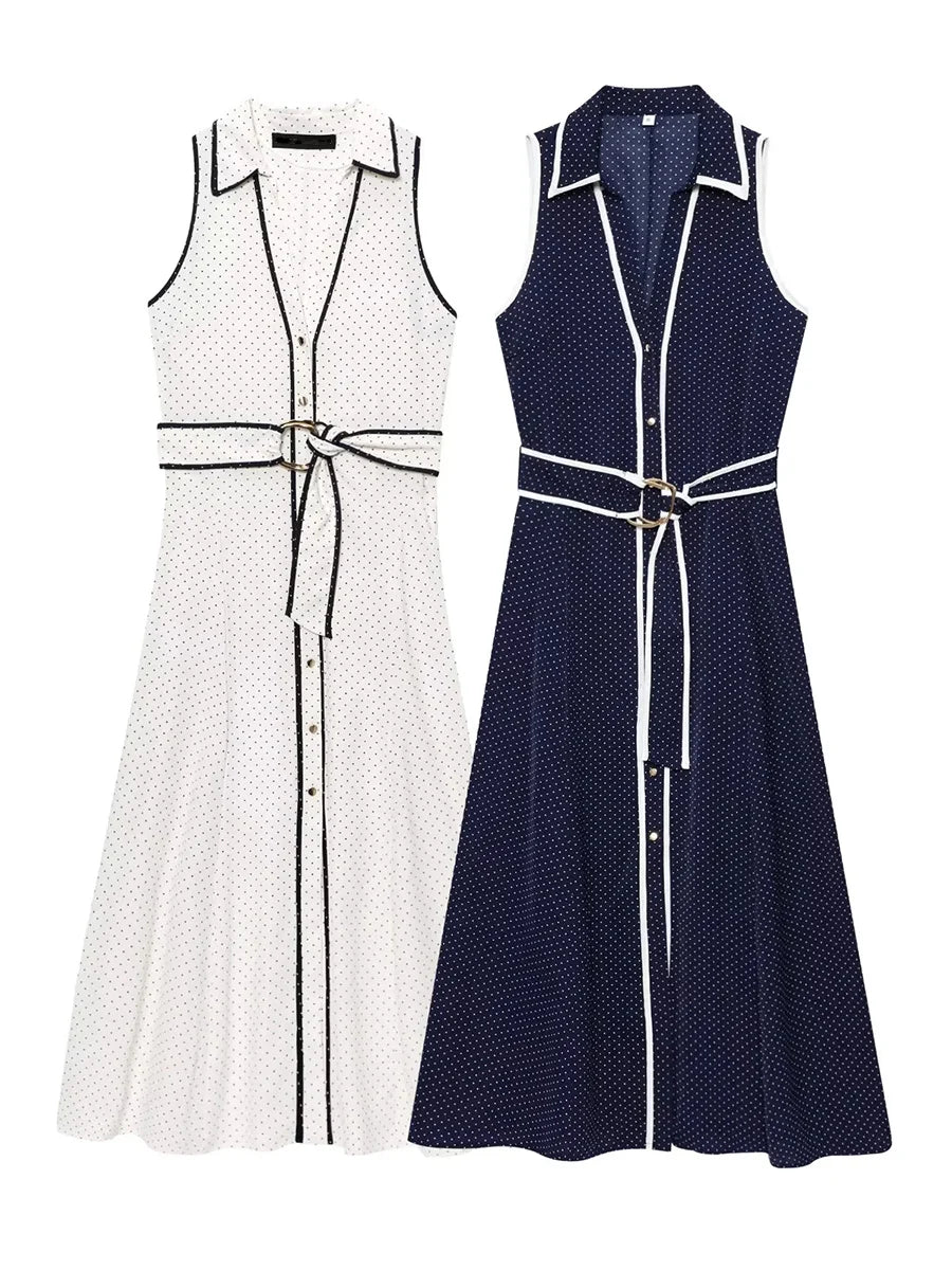 Two sleeveless dresses, one white and one navy with black polka dots,