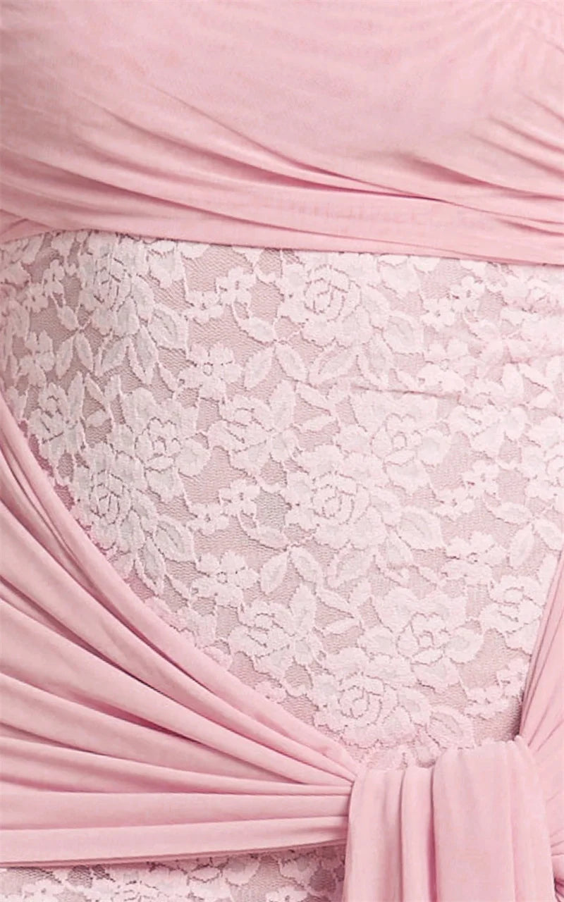 Pink lace dress with a close-up of fabric texture