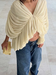 Sheer mesh blouse with deep V-neck and ruched batwing sleeves