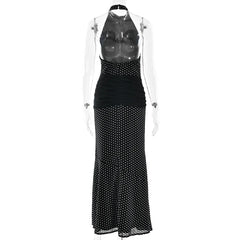 Black polka dot dress on a mannequin with a clear background