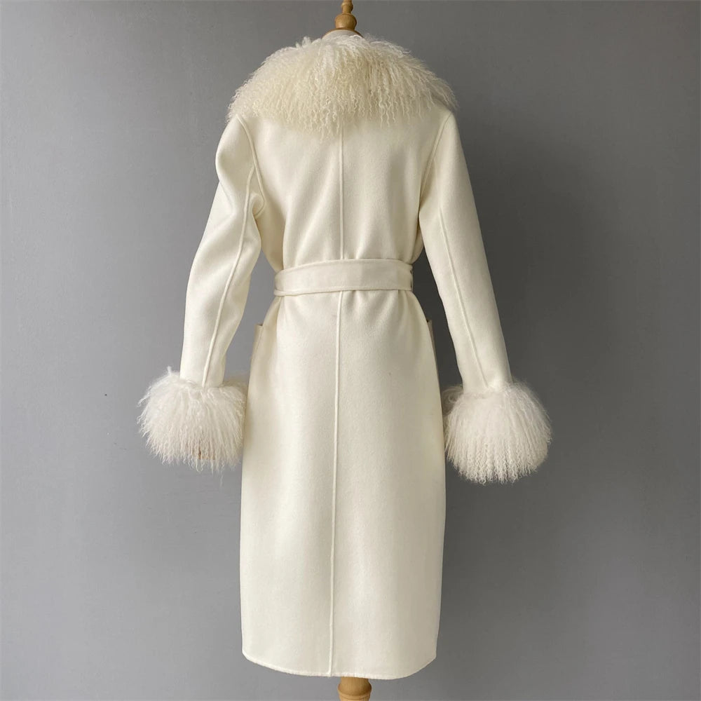 White coat with fur trim on a gray background