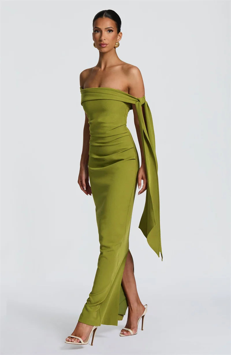 Woman wearing a green off-shoulder dress