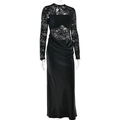 Black evening gown with lace sleeves on a white background