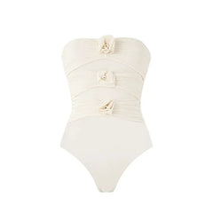 Ruched swimsuit with 3D floral embellishments