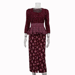 Mannequin wearing a maroon floral dress with a peplum top on a white background