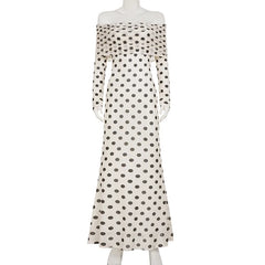 White off-shoulder dress with black polka dot pattern