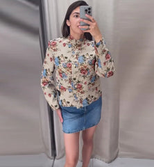 Floral mandarin collar cropped jacket worn with denim skirt