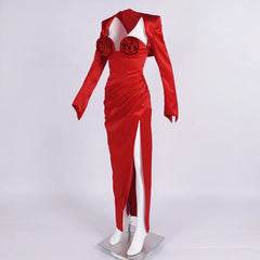 Red evening gown with floral details on a white background