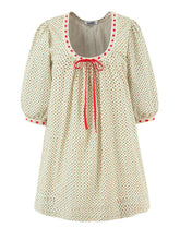 A-line mini dress with O-neck, bow tie neckline, and puff sleeves.