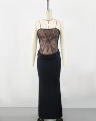 Mannequin wearing a black lace top and black pencil skirt