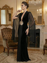 Black velvet maxi dress with V-neck and cloak sleeves