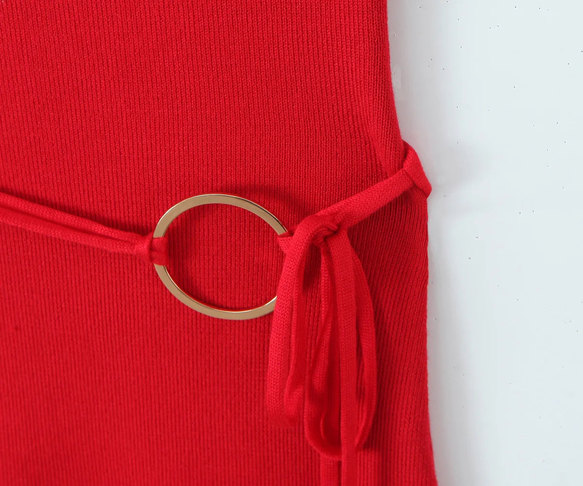 Red garment with a gold belt on a white background
