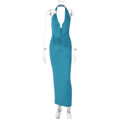 Teal halter neck dress on a mannequin against a white background