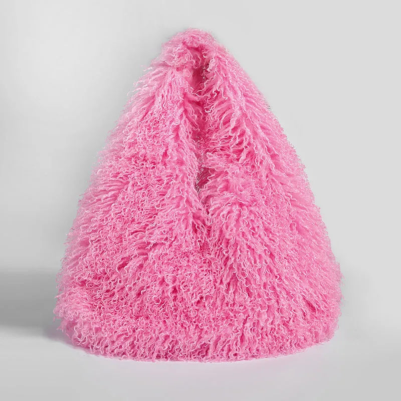 Pink faux fur textured shoulder bag.