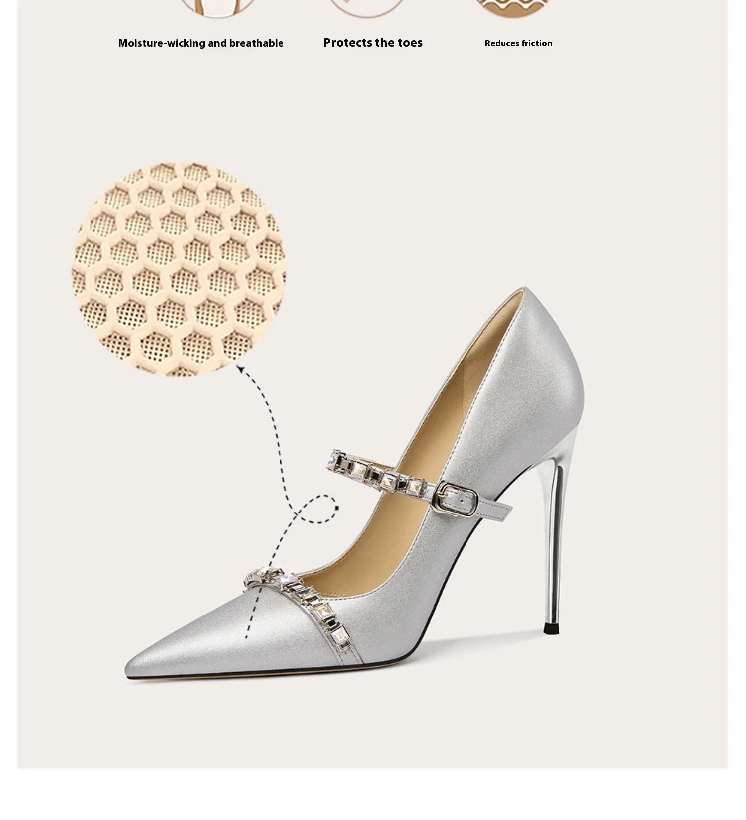 Silver high-heeled shoe with embellishments on a white background