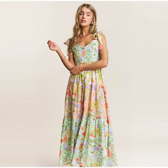 Floral smocked bust tie strap maxi dress with a flowing skirt.