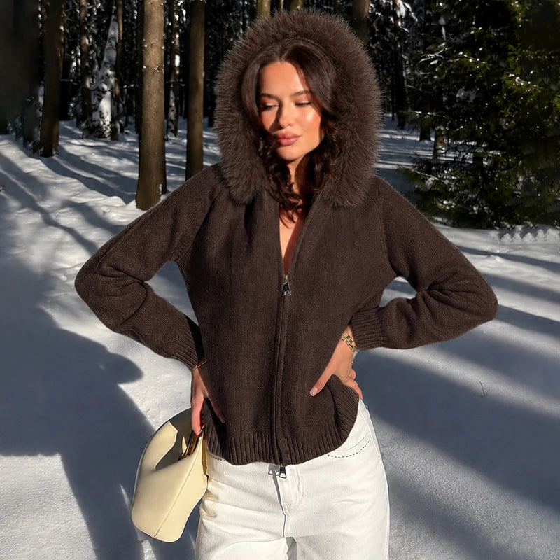 Hooded faux fur trim knit jacket, outdoors in snow